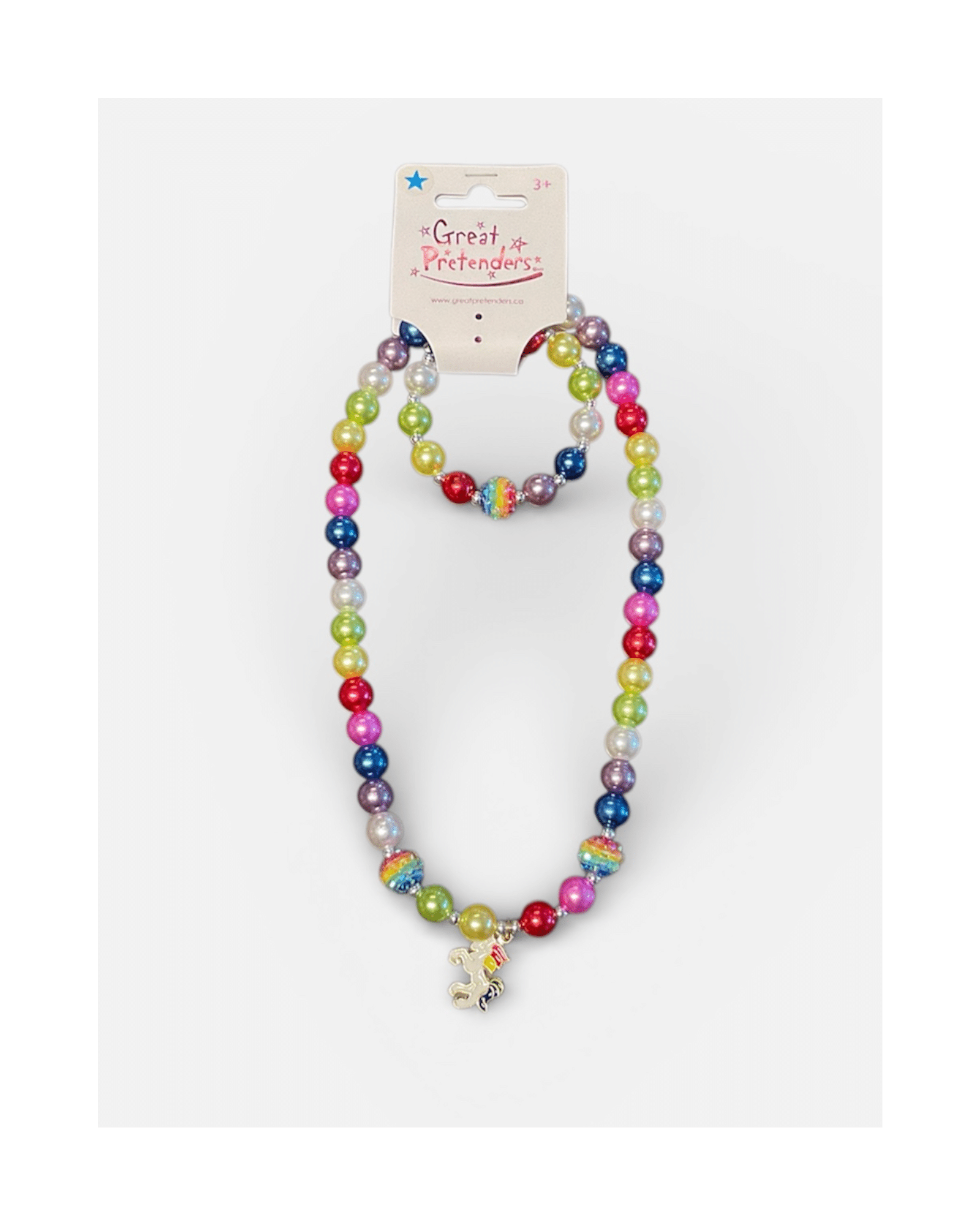 Färgglatt halsband och armband i regnbågspärlor med enhörningsberlock och glittrande pärla